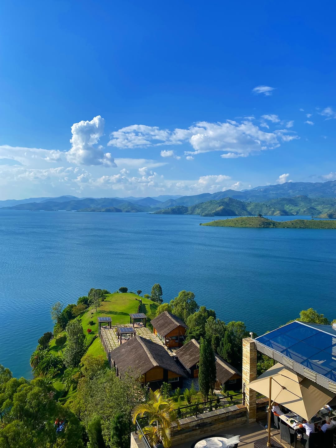 Lake Kivu sunset with boats and beaches